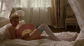 Blonde Bombshell Teasing in Lingerie'