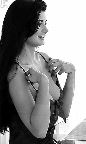 Busty Brunette Babe Showin' Off Her Knockers'