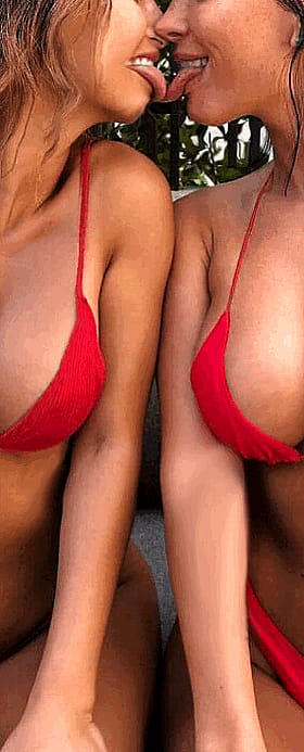 Lesbian Babes Lock Lips in Steamy Amateur Scene'