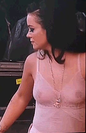 Lilly Allen flaunts her rack braless in that see-thru top, lookin' all kinds of juicy'