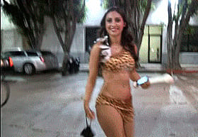 Hey, check out this hot chick walking down the street in a leopard print bikini!'