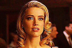 Amber Heard's Blonde Bombshell: A Celebrity's Sultry Seduction'