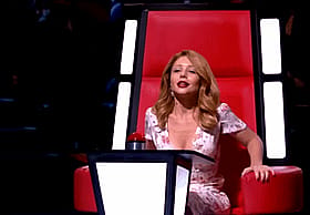 Blonde Celebrity Sits on the Voice Chair'