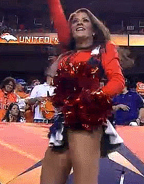 Brunette Big Tits Cheerleader Gives a Striptease'