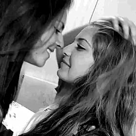 BFFs Get Steamy with a Lip-Locking Session'