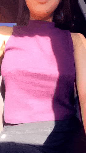 Busty babe teasing to unleash those juicy melons'