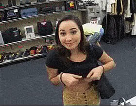Naughty shop girl flaunts her juicy melons'