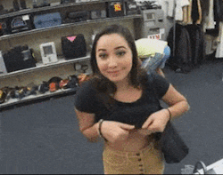 Busty brunette gets handsy with her man in public picture 1 of 1