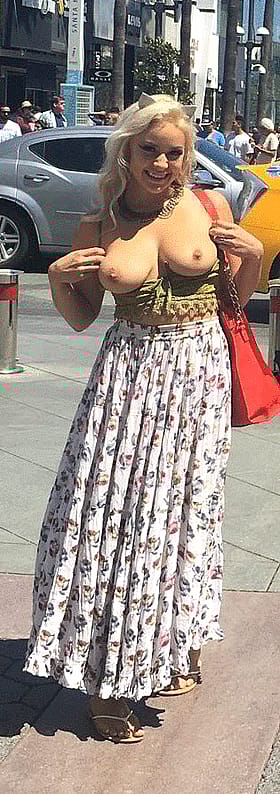 Naughty Kitty Flaunting Her Juicy Melons'