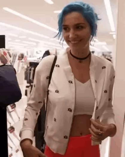 Sultry blue-haired vixen flaunts her curves picture 1 of 1