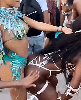 Sensual booty grinding on that sweet spot! Carnival vibes got me wild!'