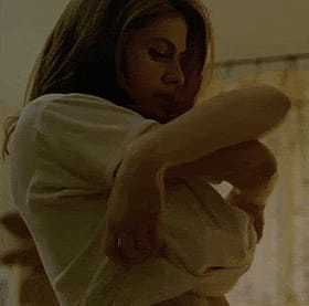 Busty Babe Teases in Steamy Movie Scene'