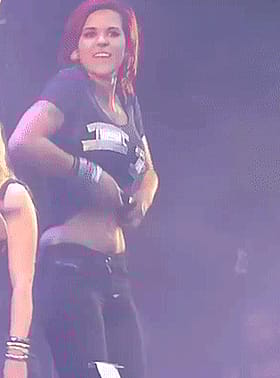 Rockin' Those Juicy Melons at the Show!'