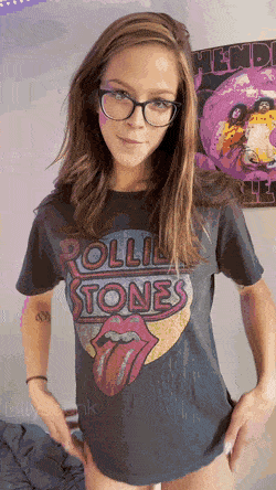 Sexy nerdy babe flashes her perky tits picture 1 of 1
