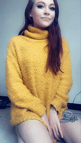 Peek-a-boo! My surprise package under this cozy yellow sweater'