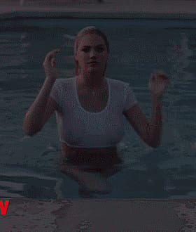 Blonde Celebrity with Massive Breasts in Swimming Pool'