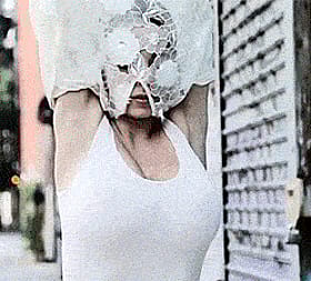 Blonde Bombshell's Sheer Street Strut'