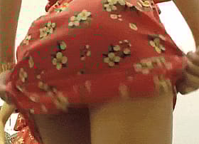 Cheeky flash of that red skirt'
