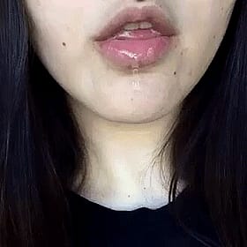 Teen Drooling with Tongue Out'