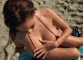 Sexy Beach Babe With Massive Melons'