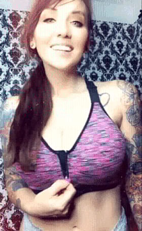 Sexy Tease Pulling Down Her Sports Bra'