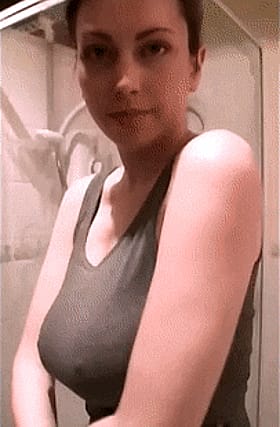 MILF With Massive Melons Peels Off Her Top'