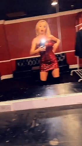 Nikki Benz teasing in that red mini dress'