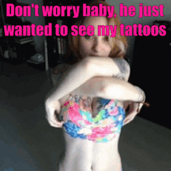 Tatted babe flashes her ink and her perfect tits picture 1 of 1
