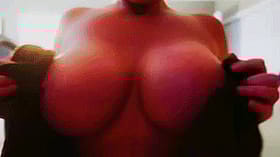 Busty Blonde Bimbo Shows Off Those Melons'