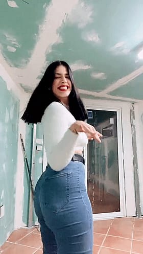 Latina Bombshell Puts That Peach on Display'