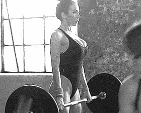 Hot Fitness Chick Lifting Weights'