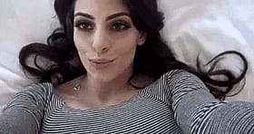 Busty Brunette Flashing Her Knockers'